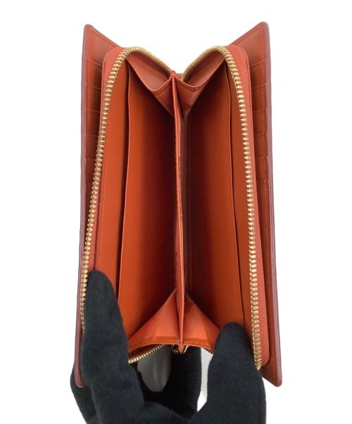 MCM（エムシーエム）MCM (エムシーエム) 長財布 オレンジの古着・服飾アイテム