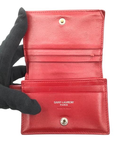 Saint Laurent Paris（サンローランパリ）Saint Laurent Paris (サンローランパリ) 2つ折りコンパクト財布 レッドの古着・服飾アイテム