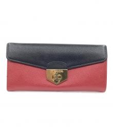 PRADA（プラダ）の古着「長財布」｜ブラック×レッド