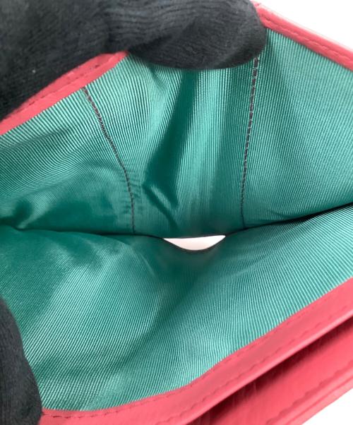 Jocomomola（ホコモモラ）Jocomomola (ホコモモラ) 2つ折り財布 ピンクの古着・服飾アイテム