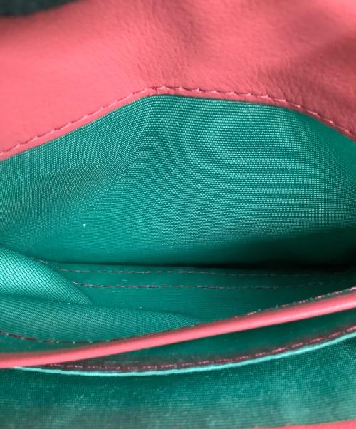 Jocomomola（ホコモモラ）Jocomomola (ホコモモラ) 2つ折り財布 ピンクの古着・服飾アイテム