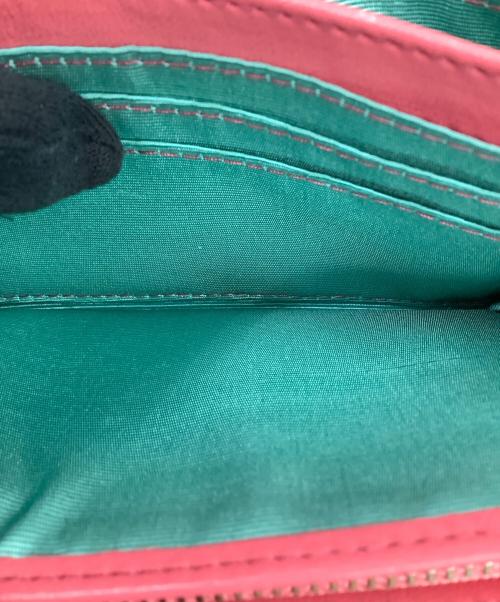 Jocomomola（ホコモモラ）Jocomomola (ホコモモラ) 2つ折り財布 ピンクの古着・服飾アイテム