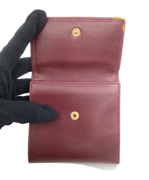 Cartier（カルティエ）Cartier (カルティエ) 3つ折り財布 ボルドーの古着・服飾アイテム