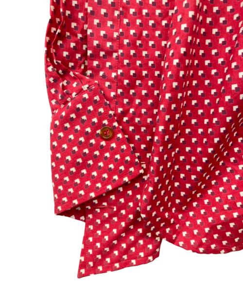 Vivienne Westwood（ヴィヴィアンウエストウッド）Vivienne Westwood (ヴィヴィアンウエストウッド) 00’s 総柄ねじれデザイン ライカ期 日本製 レッド サイズ:46 未使用品の古着・服飾アイテム