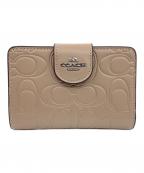 COACHコーチ）の古着「ミディアム コーナー ジップ ウォレット・シグネチャー」｜トープ