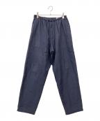 COMOLIコモリ）の古着「コットンネル テーパードパンツ」｜ネイビー