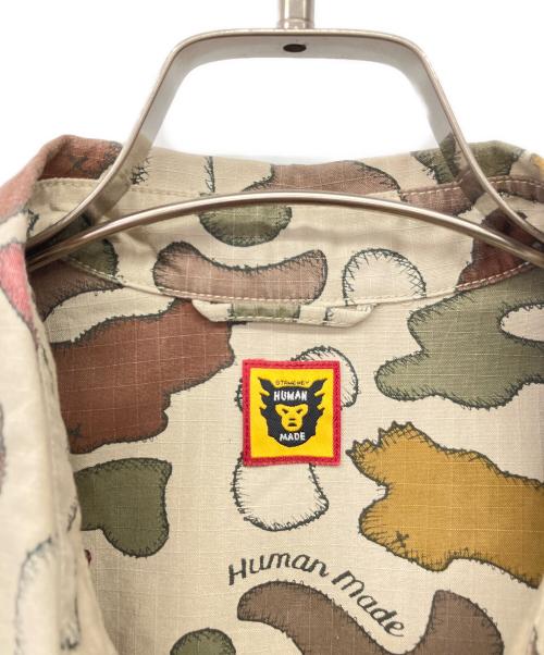 HUMAN MADE（ヒューマンメイド）HUMAN MADE (ヒューマンメイド) KAWS (カウズ) 半袖シャツ ベージュ サイズ:XLの古着・服飾アイテム