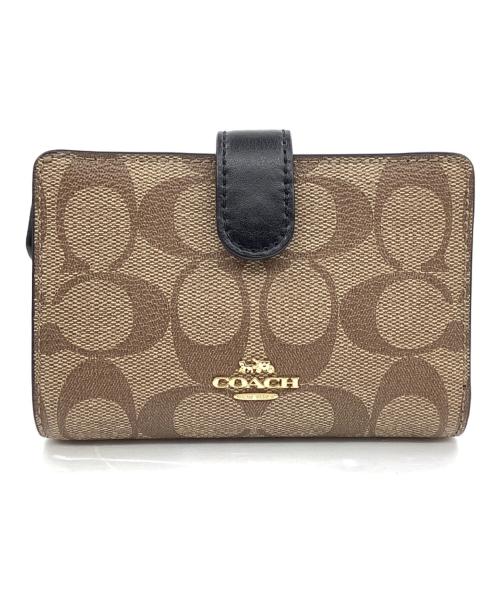 COACH（コーチ）COACH (コーチ) 2つ折り財布 ベージュ×ブラックの古着・服飾アイテム