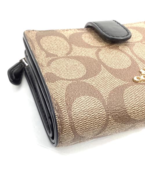 COACH（コーチ）COACH (コーチ) 2つ折り財布 ベージュ×ブラックの古着・服飾アイテム