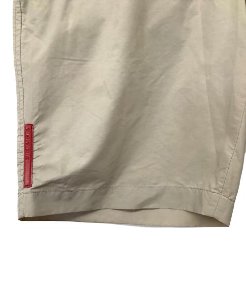 PRADA（プラダ）PRADA (プラダ) 2WAYポケット＆ポーチ脱着カーゴショーツ ベージュ サイズ:46（ML)の古着・服飾アイテム