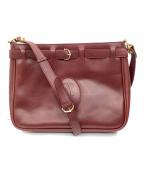 Cartierカルティエ）の古着「ショルダーバッグ」｜ワインレッド