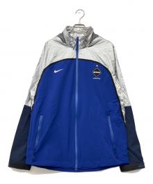 NIKE×F.C REAL BRISTOL（ナイキ×エフシーレアルブリストル）の古着「ナイロンジャケット」｜シルバー×ブルー
