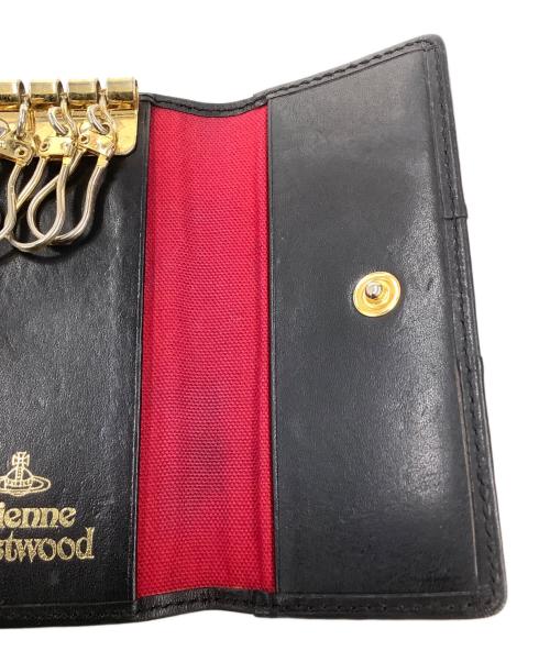 Vivienne Westwood（ヴィヴィアンウエストウッド）Vivienne Westwood (ヴィヴィアンウエストウッド) キーケース ブラック×ピンクの古着・服飾アイテム