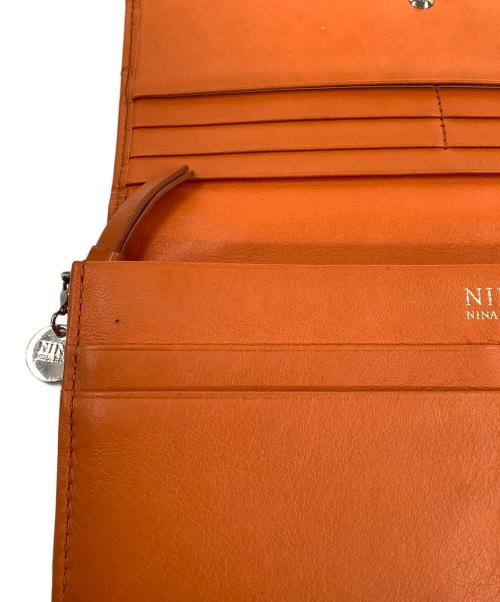 NINA RICCI（ニナリッチ）NINA RICCI (ニナリッチ) ディエップパース長財布 オレンジの古着・服飾アイテム