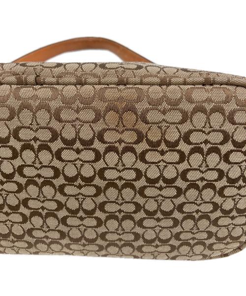 COACH（コーチ）COACH (コーチ) ハンドポーチ ブラウンの古着・服飾アイテム
