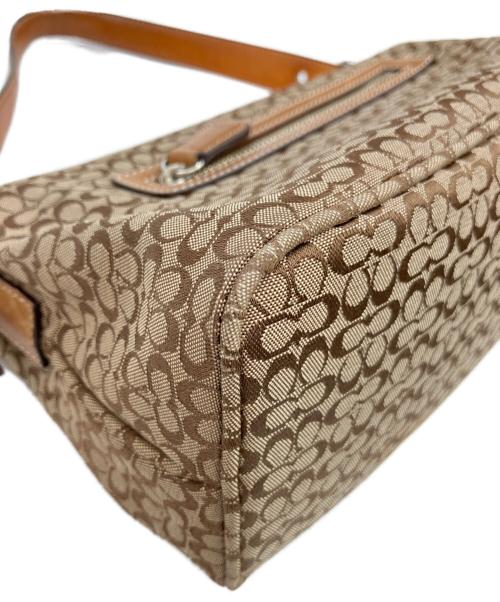 COACH（コーチ）COACH (コーチ) ハンドポーチ ブラウンの古着・服飾アイテム