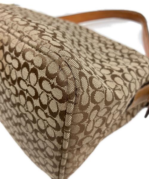 COACH（コーチ）COACH (コーチ) ハンドポーチ ブラウンの古着・服飾アイテム
