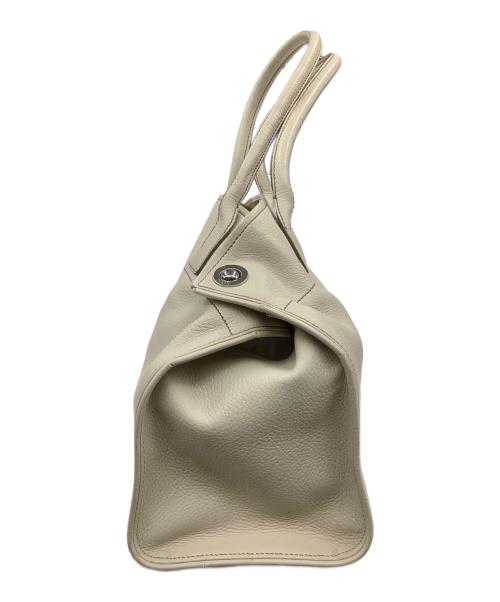 TOD'S（トッズ）TOD'S (トッズ) トートバッグ アイボリーの古着・服飾アイテム