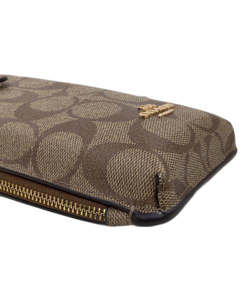 COACH（コーチ）COACH (コーチ) スマホショルダーポーチ ブラウンの古着・服飾アイテム