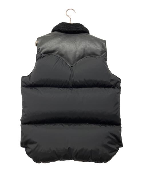 RockyMountainFeatherBed（ロッキーマウンテンフェザーベッド）RockyMountainFeatherBed (ロッキーマウンテンフェザーベッド) BEAMS (ビームス) 革切替ダウンベスト ブラック サイズ:38の古着・服飾アイテム