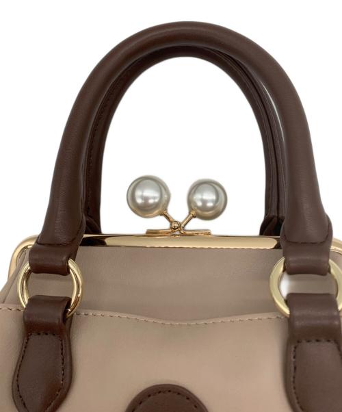 MARY QUANT（マリークヮント）MARY QUANT (マリークヮント) 巾着ショルダーバッグ ベージュ×ブラウンの古着・服飾アイテム