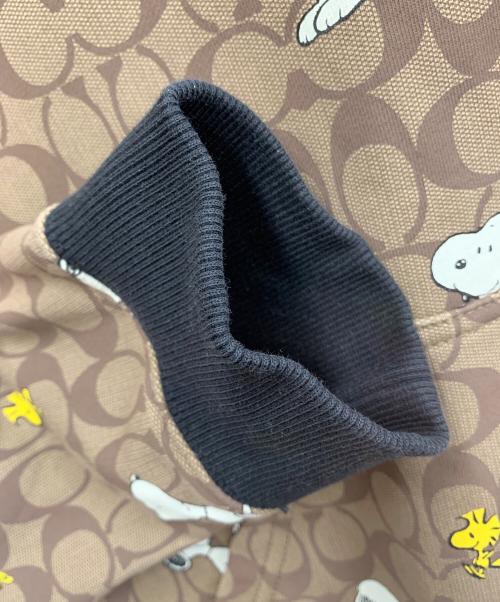 COACH（コーチ）COACH (コーチ) PEANUTS (ピーナッツ) プルオーバーパーカー ベージュ サイズ:Lの古着・服飾アイテム