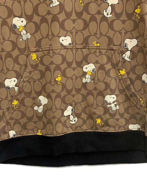 COACH（コーチ）COACH (コーチ) PEANUTS (ピーナッツ) プルオーバーパーカー ベージュ サイズ:Lの古着・服飾アイテム