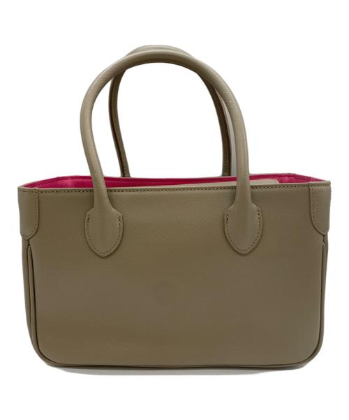 A.D.M.J.（エーディーエムジェイ）A.D.M.J. (エーディーエムジェイ) ビジューハンドバッグ ベージュ×ピンクの古着・服飾アイテム