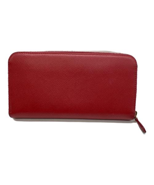 PRADA（プラダ）PRADA (プラダ) リボン付ラウンドファスナー長財布 サフィアーノ フィオッコ  レッドの古着・服飾アイテム
