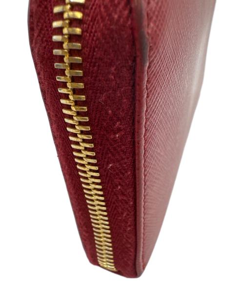 PRADA（プラダ）PRADA (プラダ) リボン付ラウンドファスナー長財布 サフィアーノ フィオッコ  レッドの古着・服飾アイテム
