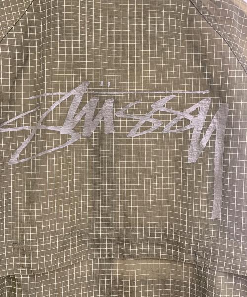 stussy（ステューシー）stussy (ステューシー) BEACH SHELL TRANSPARENT RIPSTOP カーキ サイズ:Mの古着・服飾アイテム