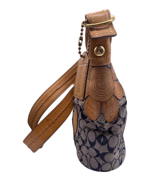 COACH（コーチ）COACH (コーチ) ブリーカー フラワーアップリケ デニムトートバッグ インディゴの古着・服飾アイテム