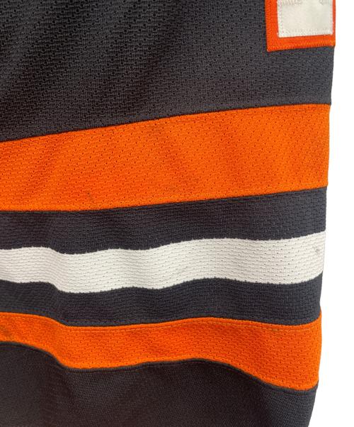 REEBOK（リーボック）REEBOK (リーボック) ゲームシャツ ブラック×オレンジ サイズ:56の古着・服飾アイテム