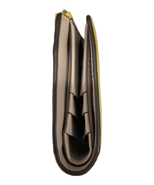 Kate Spade（ケイトスペード）Kate Spade (ケイトスペード) margaux(マルゴー)2つ折り財布 イエローの古着・服飾アイテム