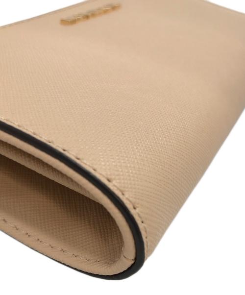 MICHAEL KORS（マイケル・コース）MICHAEL KORS (マイケルコース) ラウンドファスナー長財布 ベージュの古着・服飾アイテム