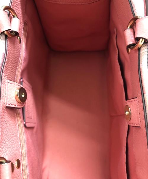 COACH（コーチ）COACH (コーチ) デンプシー キャリーオール　シグネチャー ピンクの古着・服飾アイテム