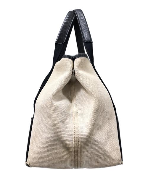 BALENCIAGA（バレンシアガ）BALENCIAGA (バレンシアガ) ネイビーカバスSトート アイボリー×ブラックの古着・服飾アイテム