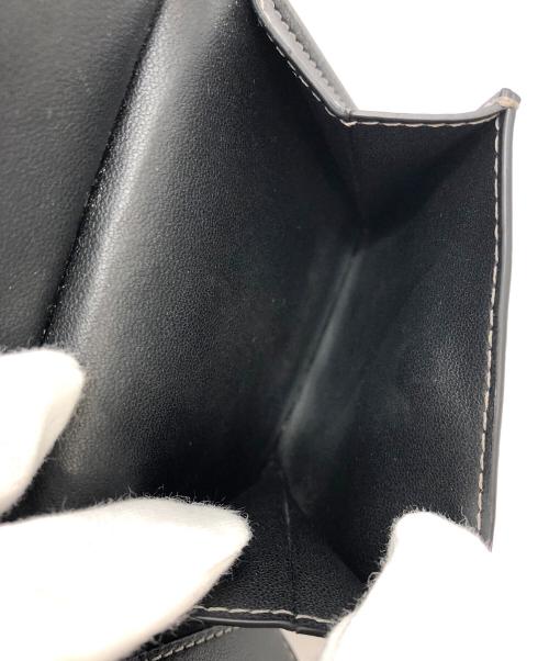 COACH（コーチ）COACH (コーチ) シグネチャーモノグラムプリント　2つ折り財布 ブラック×ブラウンの古着・服飾アイテム