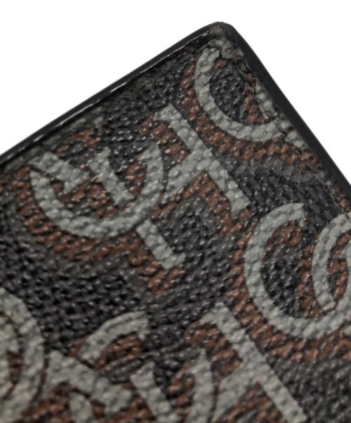 COACH（コーチ）COACH (コーチ) シグネチャーモノグラムプリント　2つ折り財布 ブラック×ブラウンの古着・服飾アイテム
