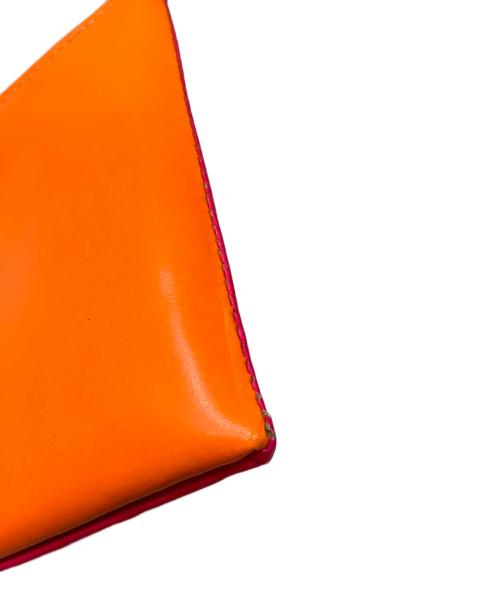 COMME des GARCONS（コムデギャルソン）COMME des GARCONS (コムデギャルソン) スーパーフロー　コインケース オレンジ×ピンクの古着・服飾アイテム