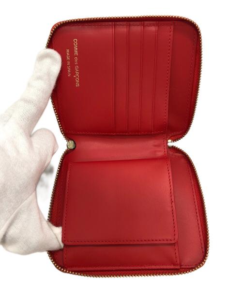 COMME des GARCONS（コムデギャルソン）COMME des GARCONS (コムデギャルソン) ビッグボウ　ラウンドファスナー財布 レッドの古着・服飾アイテム