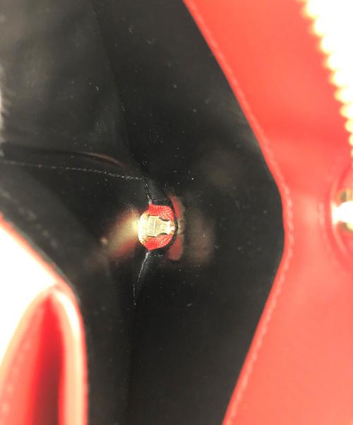 COMME des GARCONS（コムデギャルソン）COMME des GARCONS (コムデギャルソン) ビッグボウ　ラウンドファスナー財布 レッドの古着・服飾アイテム