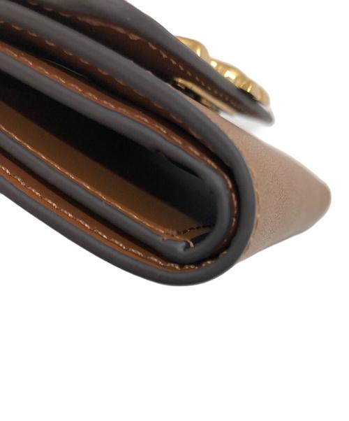 TORY BURCH（トリーバーチ）TORY BURCH (トリーバーチ) 3つ折り財布 ブラウンの古着・服飾アイテム