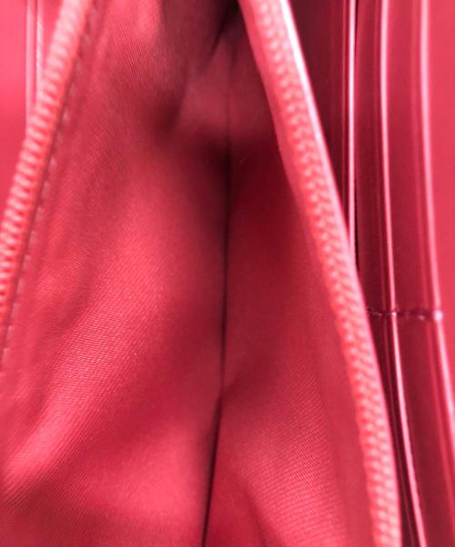 COACH（コーチ）COACH (コーチ) シグネチャーラウンドファスナー　長財布 アイボリー×レッドの古着・服飾アイテム