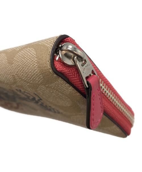 COACH（コーチ）COACH (コーチ) シグネチャーラウンドファスナー　長財布 アイボリー×レッドの古着・服飾アイテム