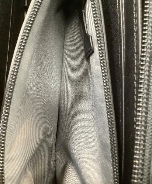 TUMI（トゥミ）TUMI (トゥミ) ラウンドファスナー長財布 ブラックの古着・服飾アイテム