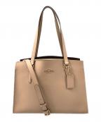 COACHコーチ）の古着「テイタムキャリーオール バッグ」｜ブラウン