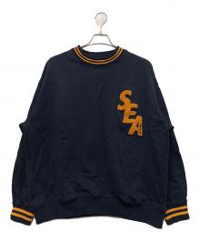 WIND AND SEA（ウィンダンシー）の古着「スウェット」｜ネイビー×オレンジ