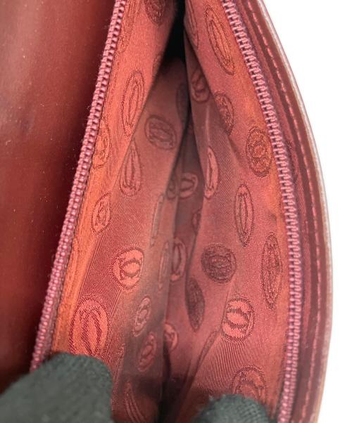 Cartier（カルティエ）Cartier (カルティエ) 二つ折り長財布 ボルドーの古着・服飾アイテム