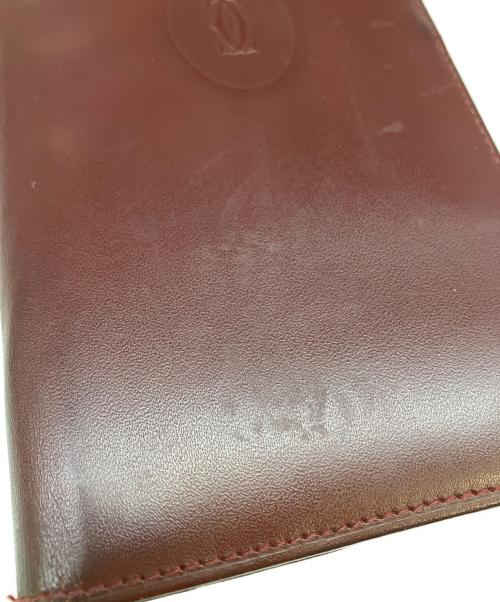 Cartier（カルティエ）Cartier (カルティエ) 二つ折り長財布 ボルドーの古着・服飾アイテム